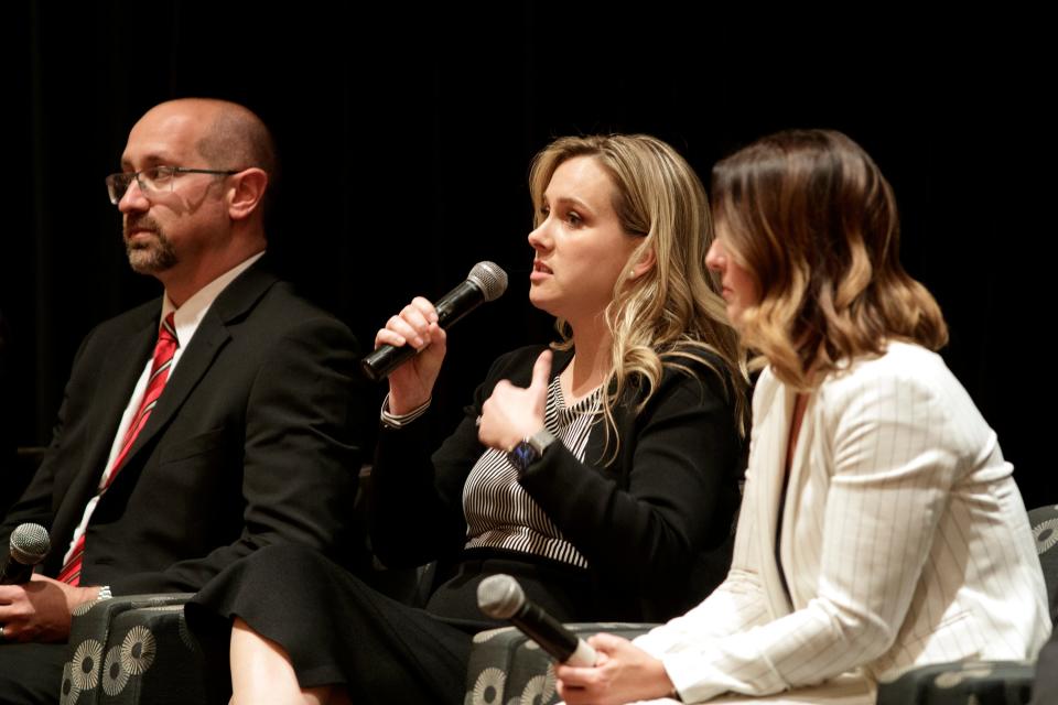 Primary candidate Natalie Lough, center, speaks during a candidate forum hosted by The Lincoln Club of the Coachella Valley in Rancho Mirage, Calif., on May 9, 2022.