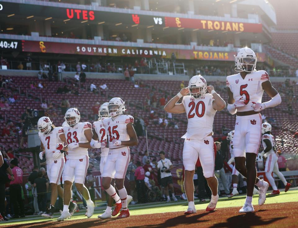 The Utah Utes warm up before a game against the USC Trojans at the Los Angeles Memorial Coliseum on Saturday, Oct. 21, 2023. | Laura Seitz, Deseret News