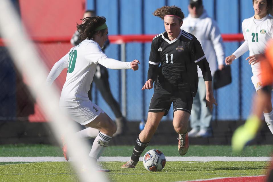 Unioto sophomore Lucas Hanes, No. 11, dribbles during his team’s victory against Athens on Nov. 6, 2021. Hanes led the league with 37 goals.