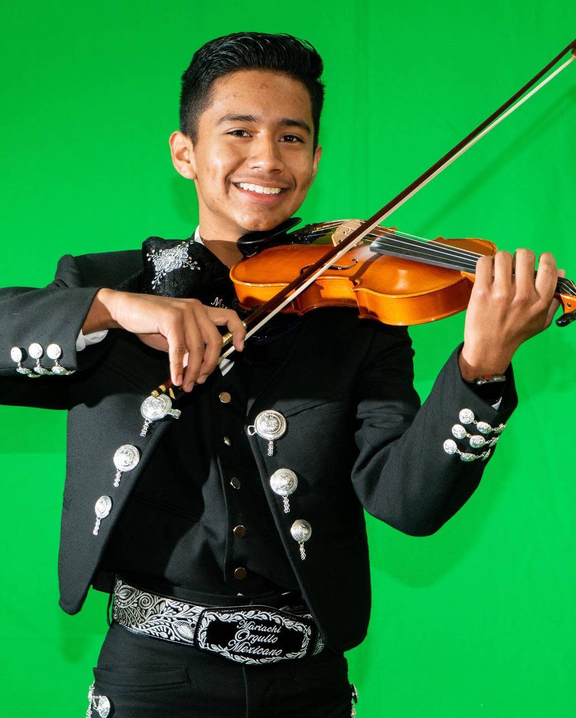 Benjamin Isaac Castañeda Floran, 17, smiles for a photo in a traditional charro outfit. The senior at North Side High School, who was killed Thanksgiving morning 2019 in a crash in North Richland Hills involving a wrong-way driver, had a passion for playing mariachi music, according to his family and friends.