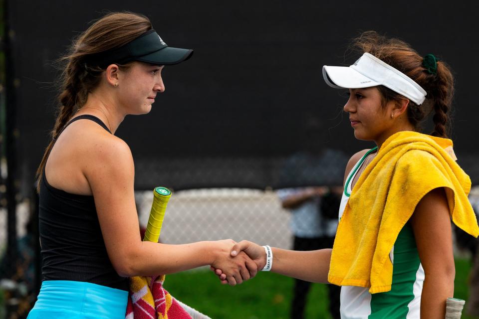 Orem’s Maya Inouye shakes hands with Hillcrest’s Fabiana Gonzalez after Inouye’s victory in the first singles finals during the 2023 4A Girls Tennis Championships at Liberty Park Tennis Courts in Salt Lake City on Saturday, Sept. 30, 2023. Inouye won the match during a tie-break game in the third set. | Megan Nielsen, Deseret News