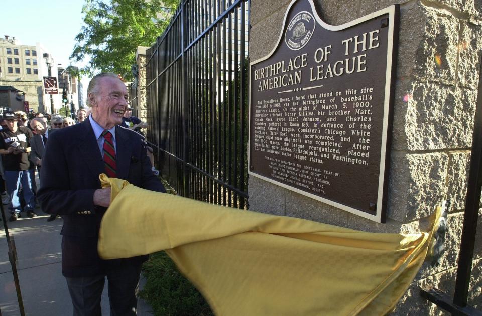 In 2001, Charles Comiskey of the Chicago White Sox unveils a marker on the fence of the Milwaukee Journal Sentinel newspaper's parking lot that marks the site where the American League was born.