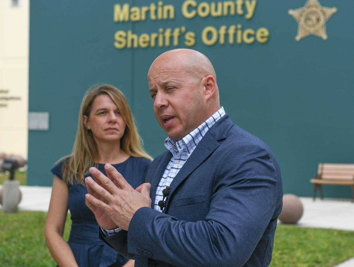 Martin County sheriff's Chief Deputy John Budensiek and his wife Ada at his side, speaks of his intention to run for sheriff of Martin County, on Wednesday, March 6, 2024, at the Sheriff’s Office in Stuart.