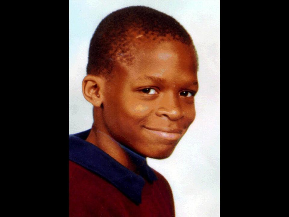 Damilola Taylor headshot, Nigerian boy murdered in London, Britain, photo on black