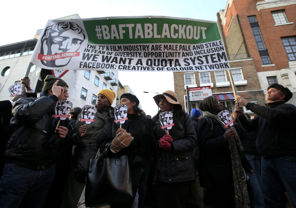 Protesters who are part of a group called Creatives of Colour Network stage a “peaceful” demonstration at the junction of Russell Street and Bow Street in London, ahead of the EE British Academy Film Awards, at the Royal Opera House, London, against what it describes as a lack of diversity in front of the camera.