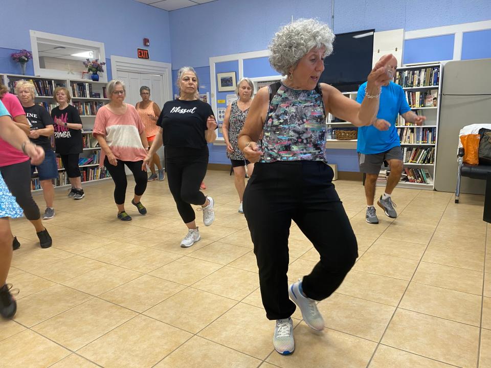 Rhonda DiCarlo leads her Shake It Up class, which she refers to as "age appropriate Zumba" at the Center for Active Living. The group recently performed a flash mob at Short Sands Beach.