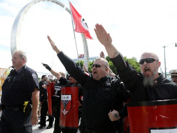 National Socialist Movement members demonstrate against the LGBT event Motor City Pride (REUTERS)