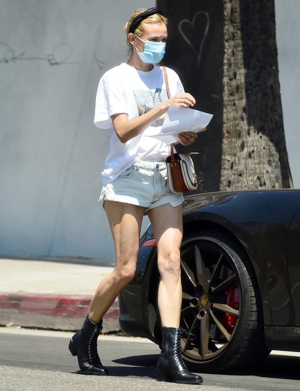 <p>Diane Kruger looks fit and casual as she makes a stop at the UPS Store in L.A. on Monday. </p>