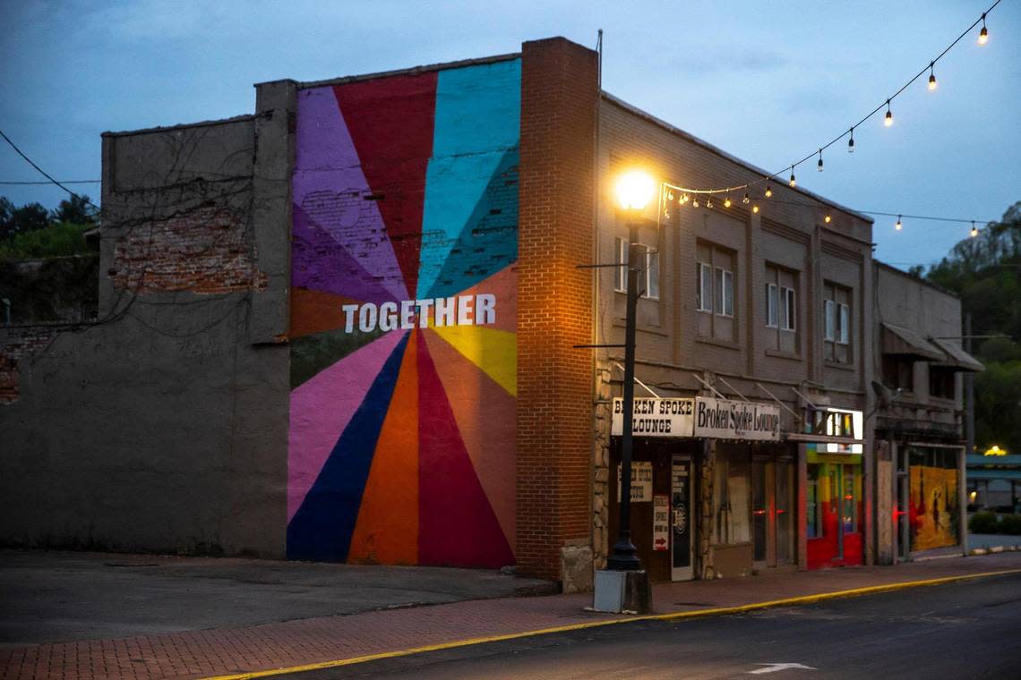 A mural in downtown Hazard, Ky., is illuminated by a streetlight on Thursday, April 28, 2022.