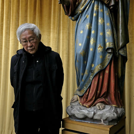 Former head of the Catholic Church in Hong Kong, Cardinal Joseph Zen, 86, poses at a news conference in Hong Kong, China February 9, 2018. REUTERS/Bobby Yip