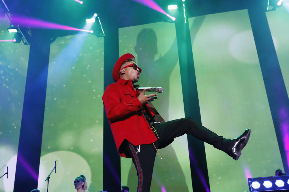 Singer Ozuna performs during the Coca Cola Flow Reggaeton festival in Mexico City, Saturday, Nov. 23, 2019. (AP Photo/Ginnette Riquelme)