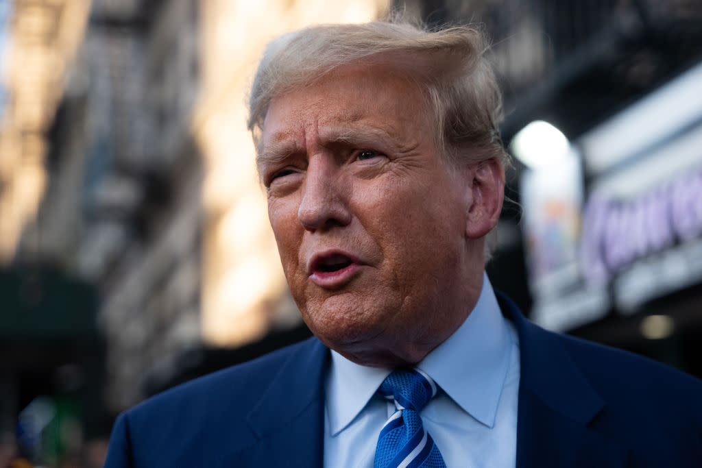 Former president Donald Trump speaks to the media as he visits a bodega on April 16, 2024 in New York City. (Photo by Spencer Platt/Getty Images)