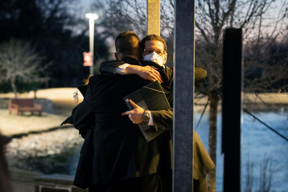Congregation Beth Israel Rabbi Charlie Cytron-Walker, facing camera, hugs a man after a healing service on Jan. 17 at White’s Chapel United Methodist Church in Southlake, Texas. Cytron-Walker was one of four people held hostage by a gunman at his Colleyville, Texas, synagogue.