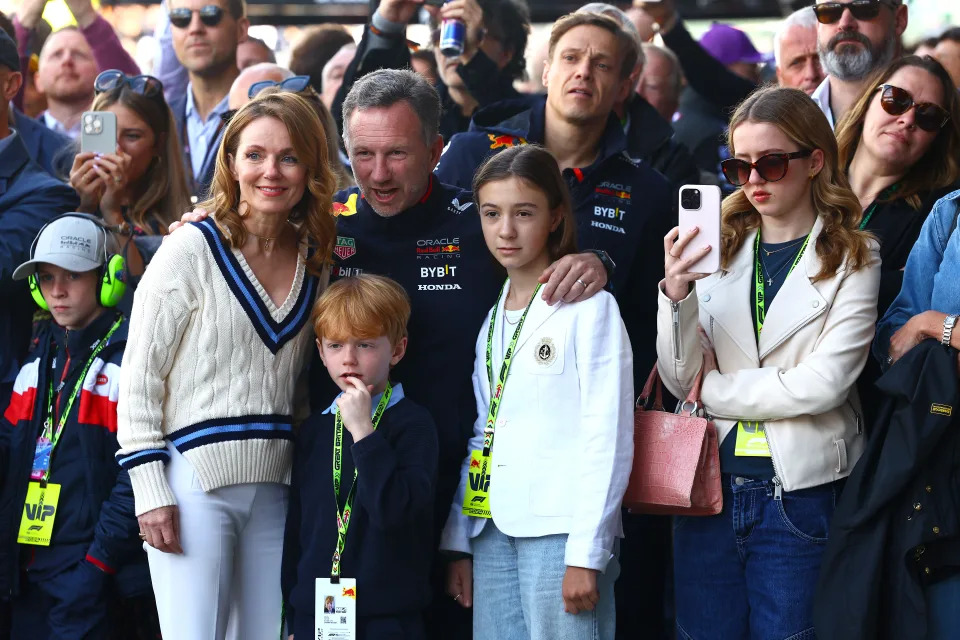 NORTHAMPTON, ENGLAND - JULY 07: Oracle Red Bull Racing Team Principal Christian Horner shows family, Geri Horner, Montague Horner, Olivia Horner and Bluebell Halliwell the Oracle Red Bull Racing team practicing pitstops prior to the F1 Grand Prix of Great Britain at Silverstone Circuit on July 07, 2024 in Northampton, England. (Photo by Mark Thompson/Getty Images)