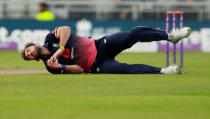 Cricket - England vs West Indies - First One Day International - Emirates Old Trafford, Manchester, Britain - September 19, 2017 England’s Liam Plunlett falls over Action Images via Reuters/Jason Cairnduff TPX IMAGES OF THE DAY