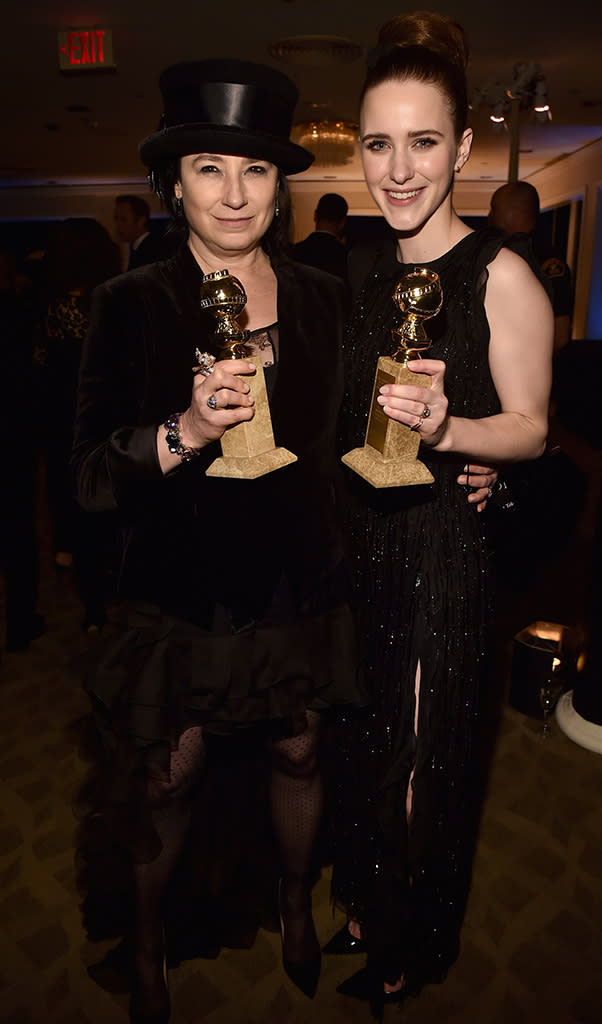 <p><em>The Marvelous Mrs. Maisel</em> writer/producer Amy Sherman-Palladino and star Rachel Brosnahan pose with awards at the Amazon Studios party at the Beverly Hilton Hotel. (Photo: Alberto E. Rodriguez/Getty Images) </p>