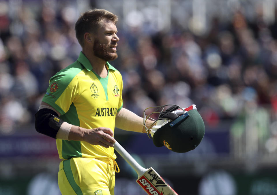 Australia's David Warner returns to the pavilion after being dismissed 1eduring the Cricket World Cup match between Australia and West Indies at Trent Bridge in Nottingham, Thursday, June 6, 2019. (AP Photo/Rui Vieira)