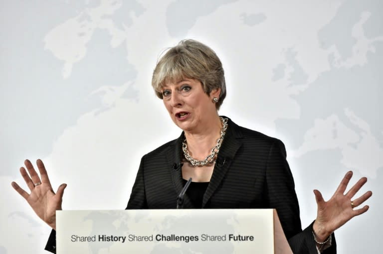 British Prime Minister Theresa May delivers a speech aimed at unlocking Brexit talks in Florence, asking for a two-year transition after the departure, pushing stocks higher and the pound lower