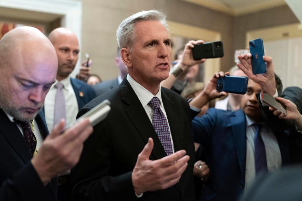 Rep. Kevin McCarthy, R-Calif., talks to reporters after the House voted to adjourn for the evening as the House met for a second day to elect a speaker and convene the 118th Congress in Washington, Wednesday, Jan. 4, 2023.