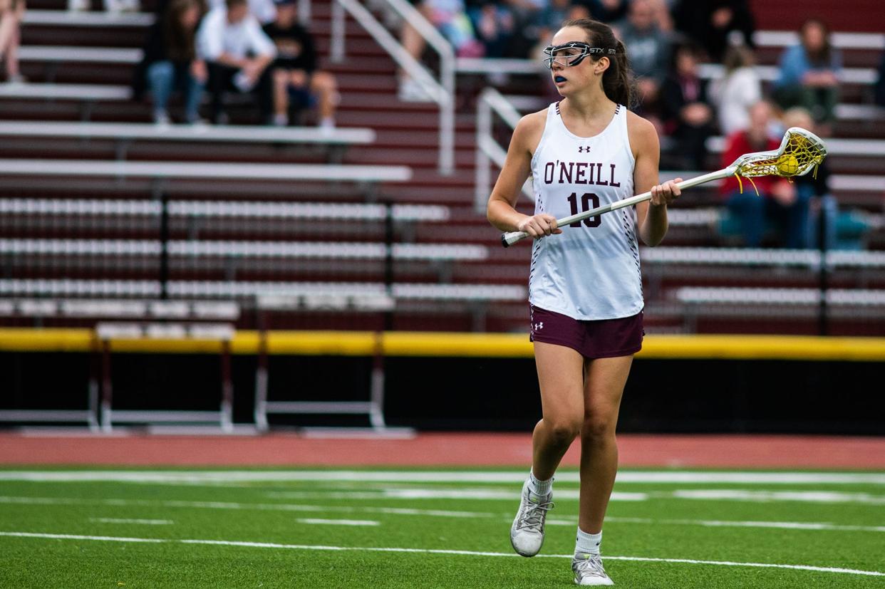 O'Neill's Bella Alberici looks for an open teammate during the Section 9 Class D girls lacrosse championship game at O'Neill High School in Highland Falls, NY on Thursday, May 26, 2022. O'Neill defeated Red Hook 19-7. KELLY MARSH/FOR THE TIMES HERALD-RECORD