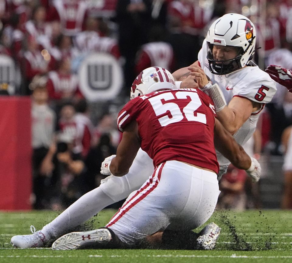 Illinois State quarterback Zack Annexstad is stopped for a 1-yard gain by Wisconsin linebacker Kaden Johnson on Sept. 3. Johnson will help UW fill an opening at linebacker for the Guaranteed Rate Bowl after Nick Herbig announced he was leaving the team to prepare the NFL draft.
