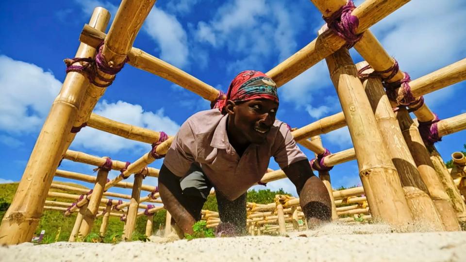 Quintavius "Q" Burdette competes in a challenge on the "Mamma Bear" episode of "Survivor," which airs Wednesdays on CBS.