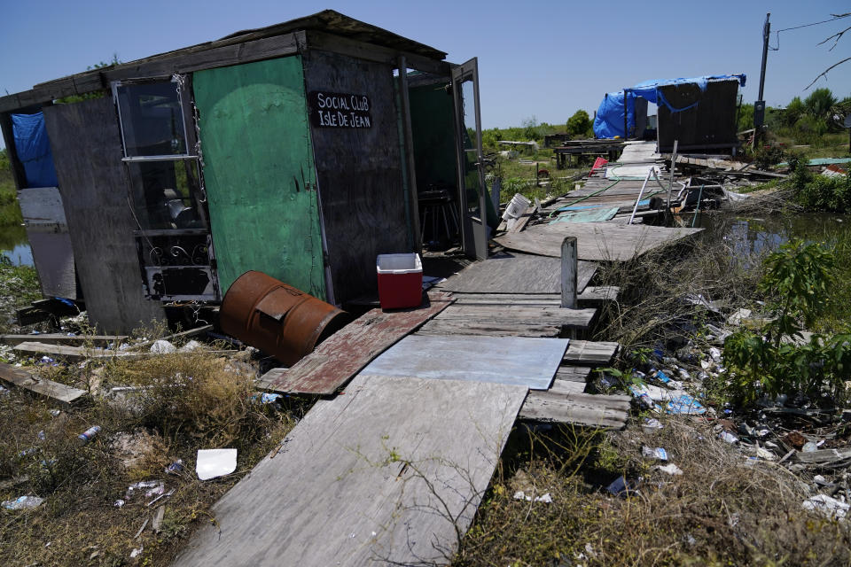 Destruction from Hurricane Ida is seen on Isle de Jean Charles, La., Thursday, May 26, 2022, nine months after the hurricane ravaged the bayou communities of southern Louisiana. (AP Photo/Gerald Herbert)
