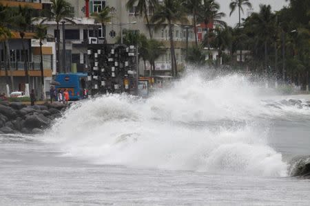 Waves break over the sea wall ahead of Hurricane Franklin in Veracruz, Mexico, August 9, 2017. REUTERS/Victor Yanez