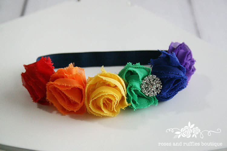 $6.95, <a href="https://www.etsy.com/listing/470017006/rainbow-baby-headband-rainbow-headband" target="_blank">RosesRufflesBoutique</a>