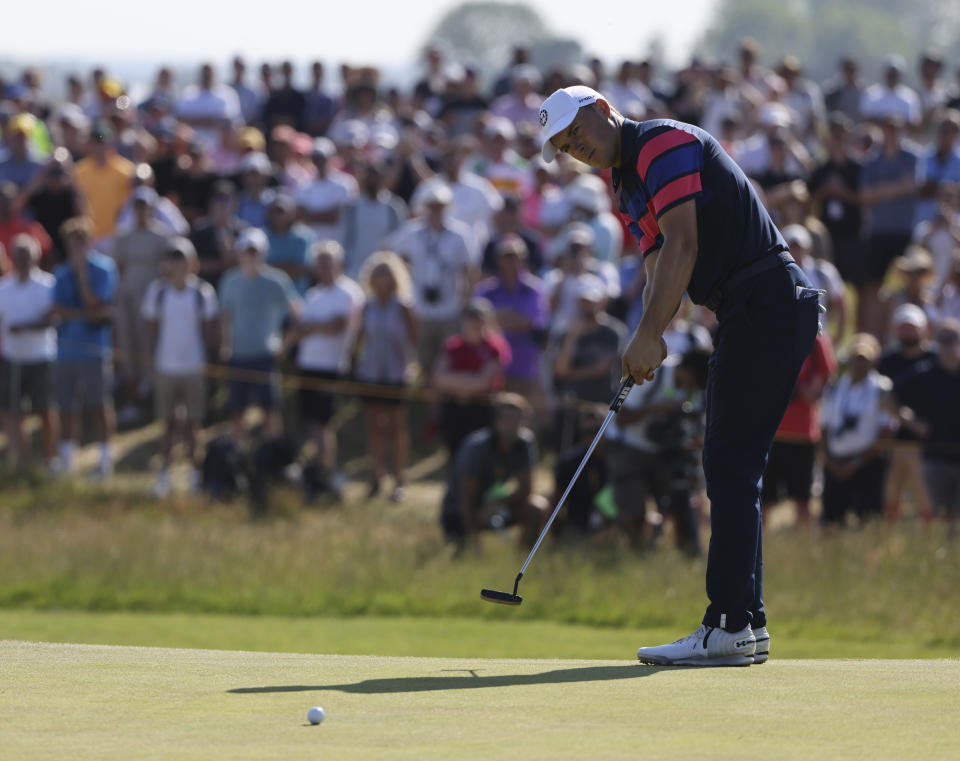 United States' Jordan Spieth putts on the 13th green during the final round of the British Open Golf Championship at Royal St George's golf course Sandwich, England, Sunday, July 18, 2021. (AP Photo/Ian Walton)