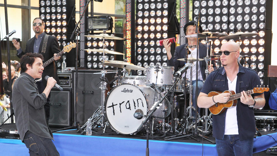 Singer Pat Monahan, Drummer Scott Underwood and and guitarist Jimmy Stafford of Train perform on NBC's 