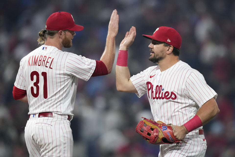 Philadelphia Phillies' Craig Kimbrel, left, and Kyle Schwarber celebrate after the Phillies won a baseball game against the Detroit Tigers, Tuesday, June 6, 2023, in Philadelphia. (AP Photo/Matt Slocum)