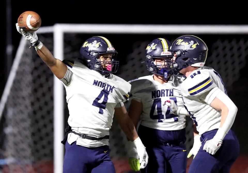 Toms River North's Jeremiah Pruitt (4) celebrates a touchdown following an interception during the first quarter of the NJSIAA Group 5 football state semifinal against Cherokee at Cherokee High School in Marlton, Friday, Nov. 17, 2023.