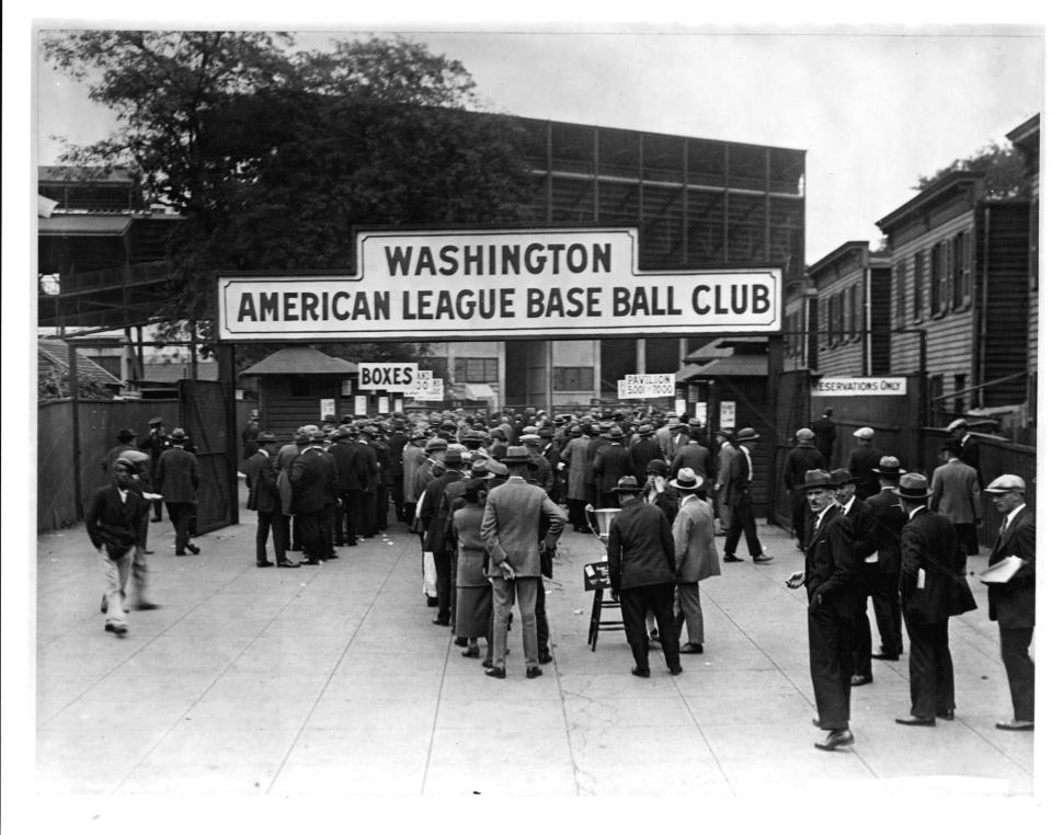 People wait at Griffith Stadium in Washington, DC, to buy tickets for the 1925 World Series.