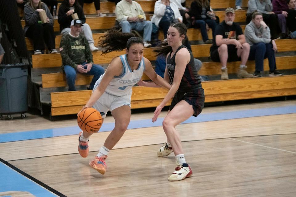 Pueblo West's Jamie Suazo dribbles past a Northridge defender during a game on Tuesday, Feb. 21, 2023.