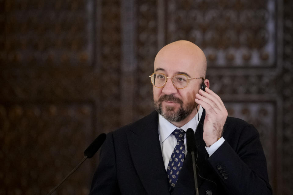 European Council President Charles Michel listens to translations during joint statements with Romanian President Klaus Iohannis at the Cotroceni Presidential Palace in Bucharest, Romania, Monday, March 27, 2023. (AP Photo/Andreea Alexandru)