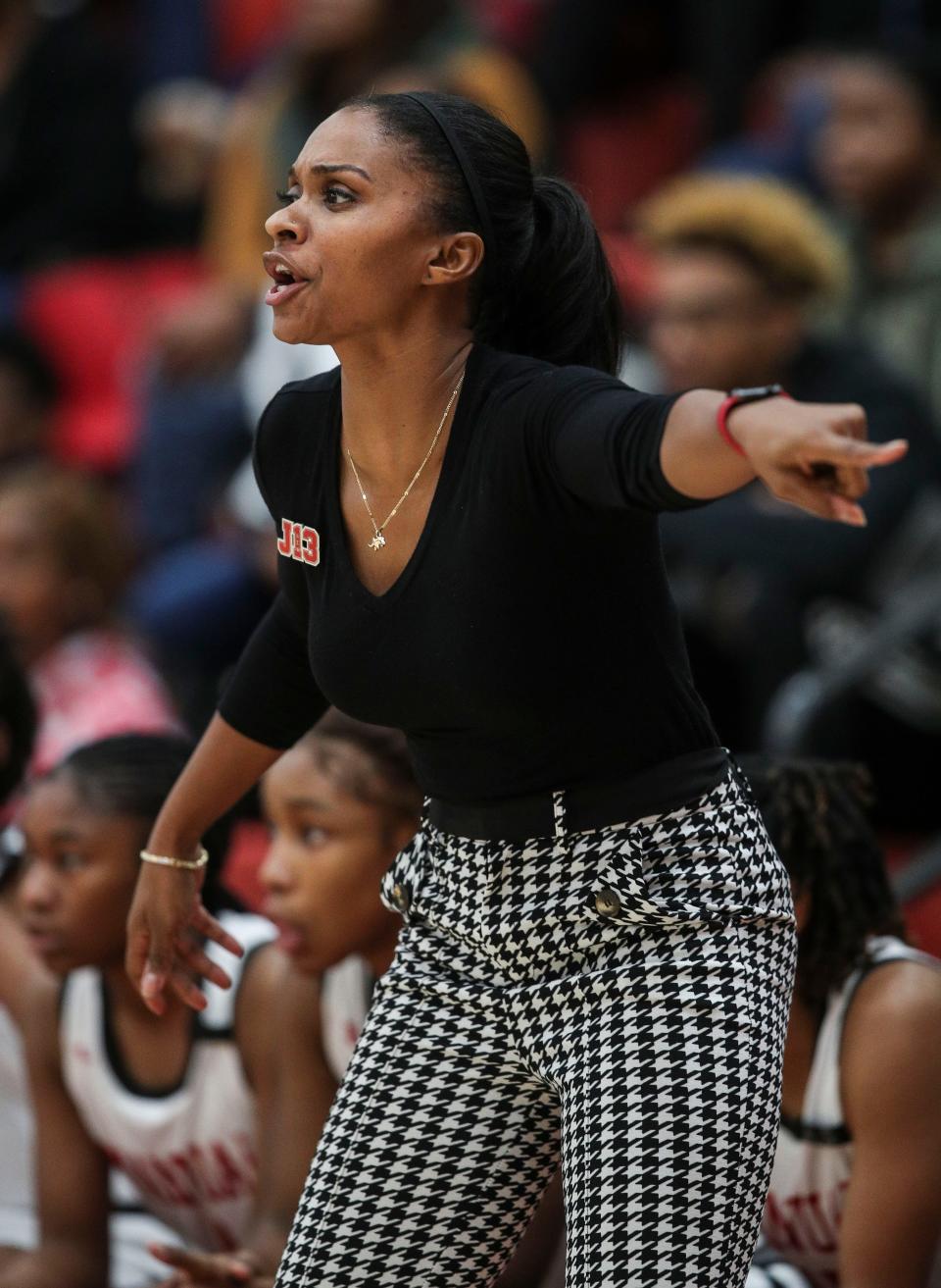 DuPont Manual's Ashley Franklin coaches Tuesday night at DuPont Manual High School. Dec. 6, 2022