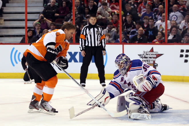 OTTAWA, ON - JANUARY 28: Kimmo Timonen #44 of the Philadelphia Flyers and Team Chara takes a shot on Henrik Lundqvist #30 of the New York Rangers and Team Alfredsson during Tim Hortons NHL Elimination Shoot Out part of the 2012 Molson Canadian NHL All-Star Skills Competition at Scotiabank Place on January 28, 2012 in Ottawa, Ontario, Canada. (Photo by Christian Petersen/Getty Images)