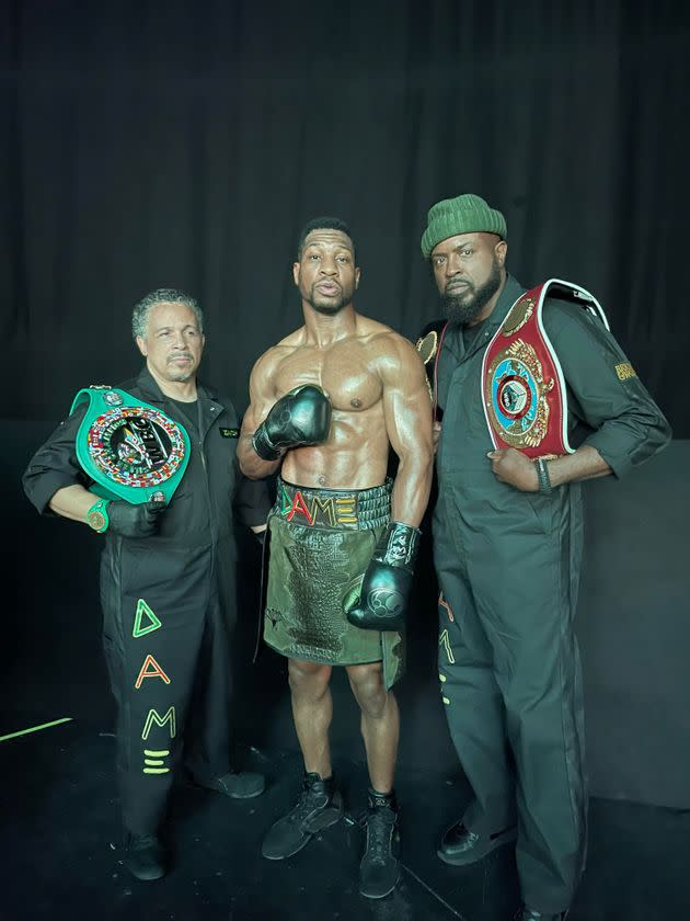 McClain (right) poses alongside Majors (center) and Lamont Lankford (who plays Damian's cutman) on the set of 