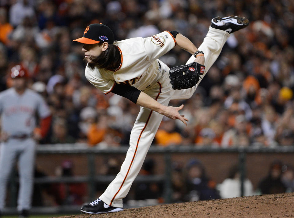 Tim Lincecum #55 of the San Francisco Giants pitches against the Cincinnati Reds in the sixth inning of Game Two of the National League Division Series at AT&T Park on October 7, 2012 in San Francisco, California. (Photo by Thearon W. Henderson/Getty Images)