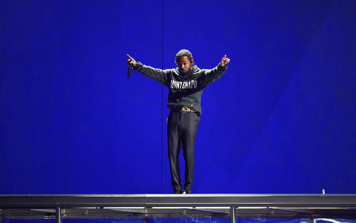 Kendrick Lamar performs on stage during the 2018 BRIT Awards show, held at the O2 Arena, London. EDITORIAL USE ONLY. PRESS ASSOCIATION Photo. Picture date: Wednesday February 21, 2018. See PA Story SHOWBIZ Brits. Photo credit should read: Victoria Jones/PA Wire.