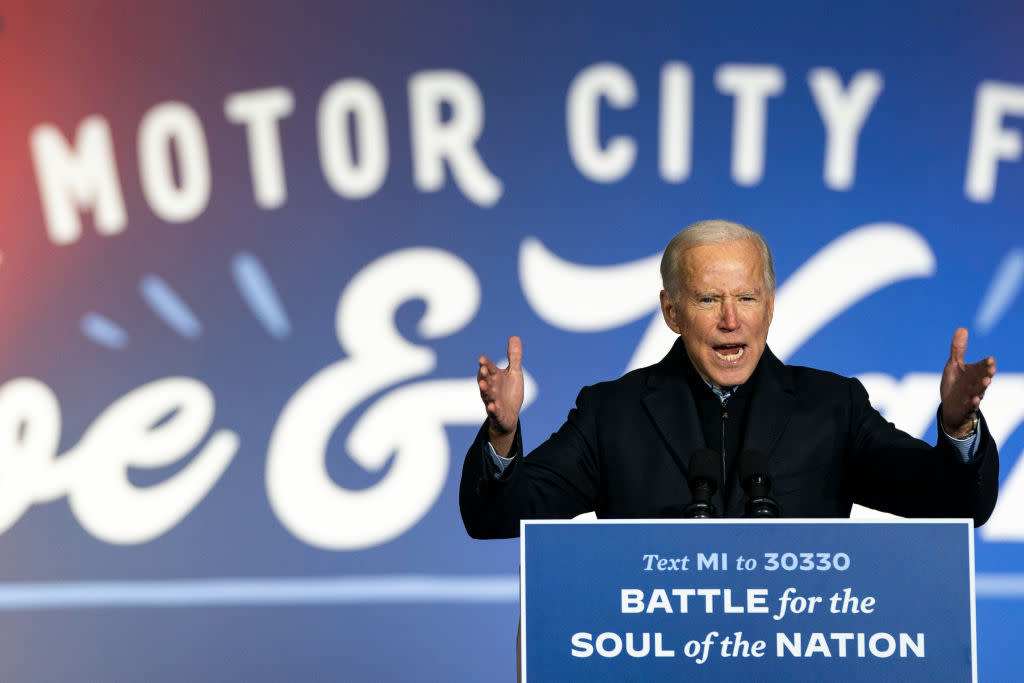  Joe Biden speaks during a drive-in campaign rally at Belle Isle on October 31, 2020 in Detroit, Michigan. 