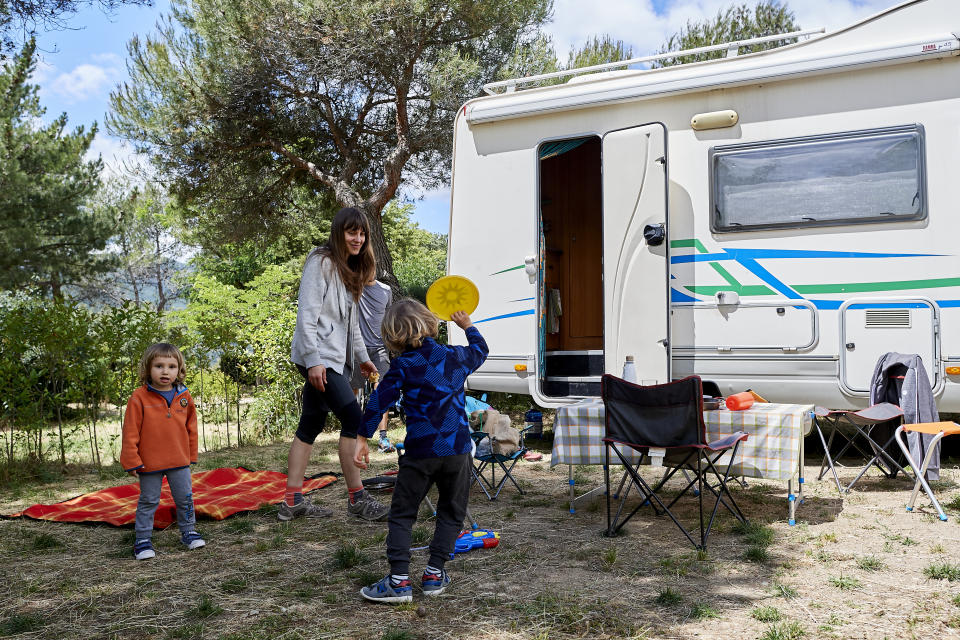 GARGANTILLA DE LOZOYA, SPAIN - JUNE 13: A family enjoys a weekend with their motorhome at the Monte Holiday campsite on June 13, 2020 in Gargantilla de Lozoya y Pinilla de Buitrago, Spain. The campsite, which had to close during the country's months-long coronavirus lockdown, has a capacity for 1,200 people and is completely booked for every weekend from mid-July through August. They have an average of 4,000 daily visits on the web and are seeing a large increase in people who come with motorhomes. (Photo by Carlos Alvarez/Getty Images)