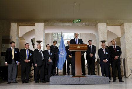 The Syrian government's delegation leaded by Bashar al-Jaafari attends a news conference after a meeting on Syria at the European headquarters of the United Nations in Geneva, Switzerland, in this March 16, 2016 file photo. REUTERS/Denis Balibouse/Files