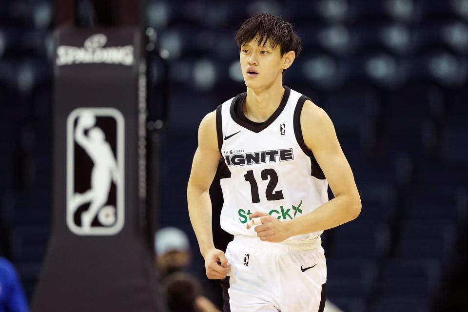 Nov 28, 2021; Stockton, CA, USA; G League Ignite forward Fanbo Zeng (12) jogs down court during the first quarter against the Stockton Kings at Stockton Arena. Mandatory Credit: Darren Yamashita-USA TODAY Sports