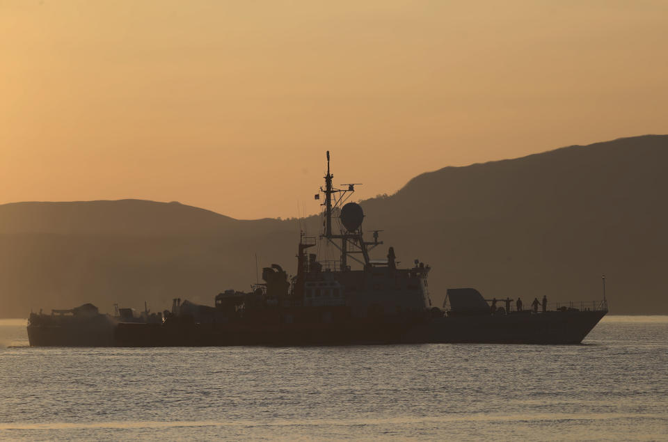 An Indonesian navy patrol ship returns after a search operation for submarine KRI Nanggala that went missing while participating in a training exercise on Wednesday, off Banyuwangi, East Java, Indonesia Sunday, April 25, 2021. Indonesia’s navy on Saturday declared its missing submarine had sunk and cracked open after finding items from the vessel over the past two days, apparently ending hope of finding any of the 53 crew members alive. (AP Photo/Achmad Ibrahim)