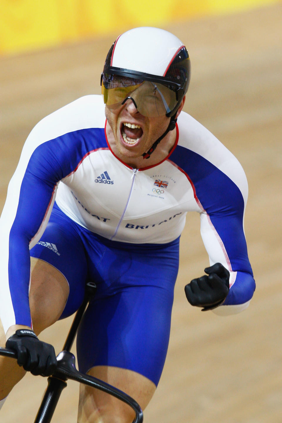 BEIJING - AUGUST 19: Chris Hoy of Great Britain celebrates the gold medal after defeating Jason Kenny of Great Britain in the Men's Sprint Finals in the track cycling event at the Laoshan Velodrome on Day 11 of the Beijing 2008 Olympic Games on August 19, 2008 in Beijing, China. (Photo by Jamie Squire/Getty Images)