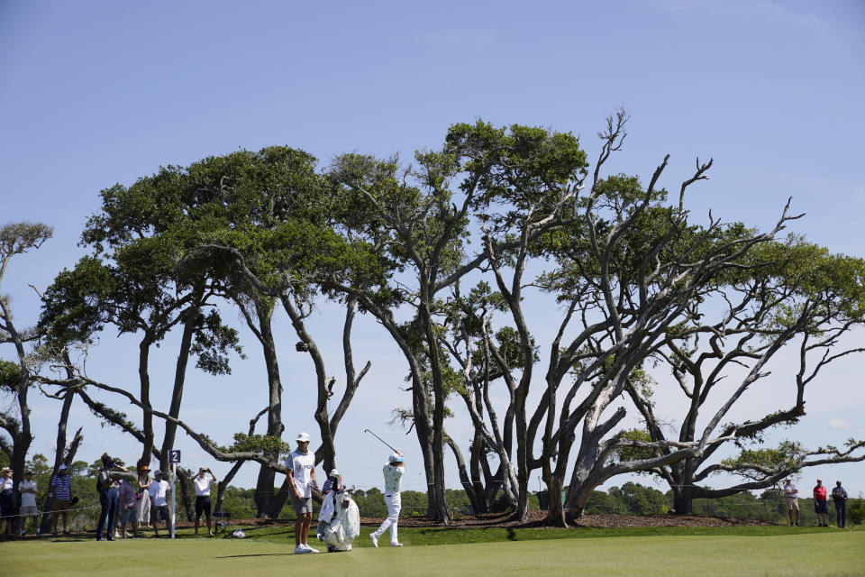 Rickie Fowler takes his third shot on the second hole during the first round of the PGA Championship golf tournament on the Ocean Course Thursday, May 20, 2021, in Kiawah Island, S.C. (AP Photo/David J. Phillip)