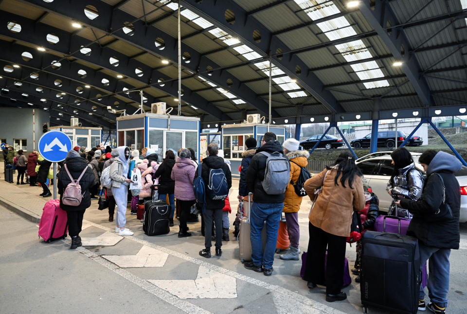 People queue upon arrival to the border of Ukraine-Slovakia, after Russia launched a massive military operation against Ukraine, in Vysne Nemecke, Slovakia, February 25, 2022. REUTERS/Radovan Stoklasa