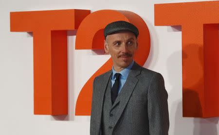 Actor Ewen Bremner poses as he arrives at the world premiere of the film "T2 Trainspotting" in Edinburgh, Scotland, Britain, January 22, 2017. REUTERS/Russell Cheyne